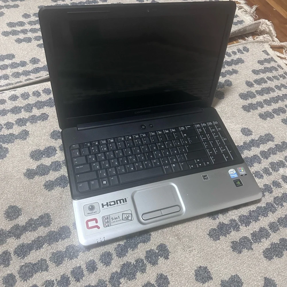 Black and Silver Laptop with Full-Size Keyboard and Numeric Keypad